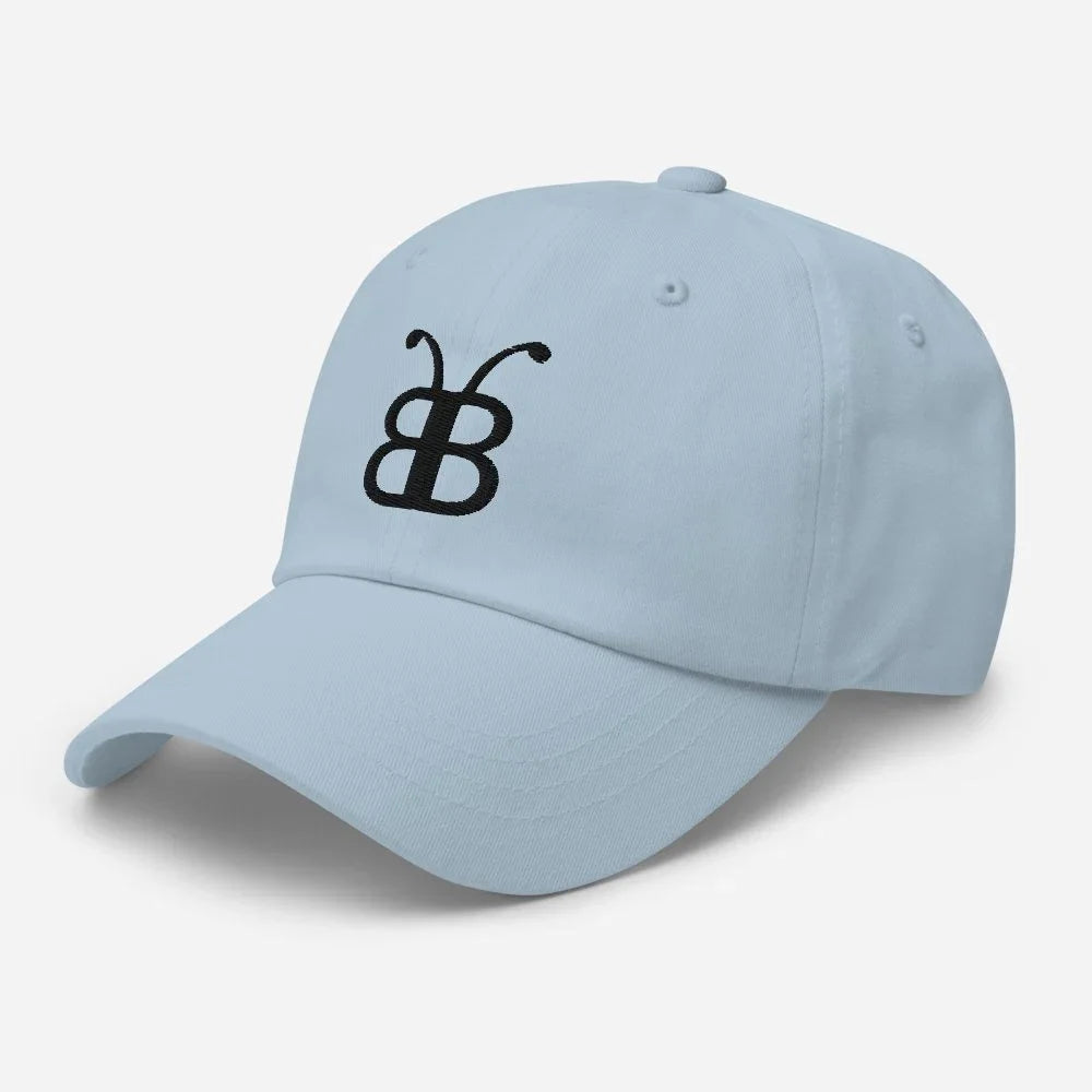 Light blue dad hat with black butterfly logo, streetwear style cap for casual fashion