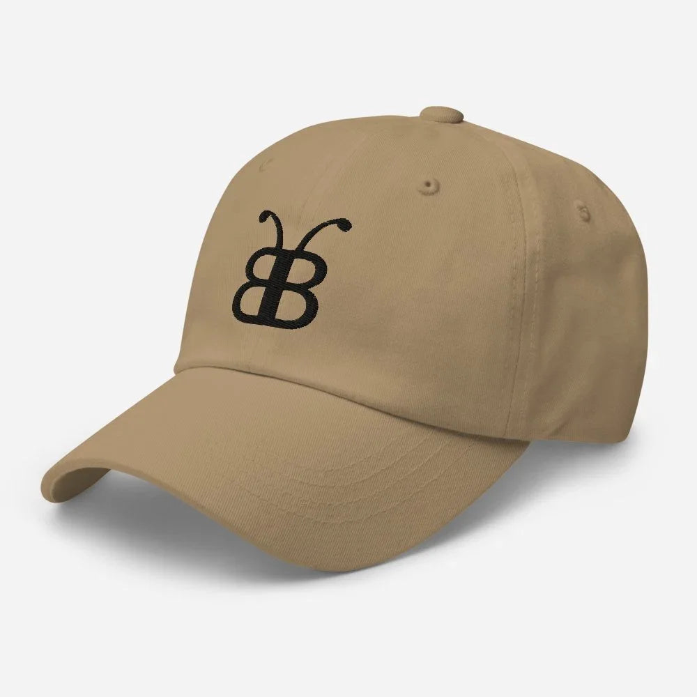 Tan dad hat with black embroidered logo, streetwear style cap for casual fashion