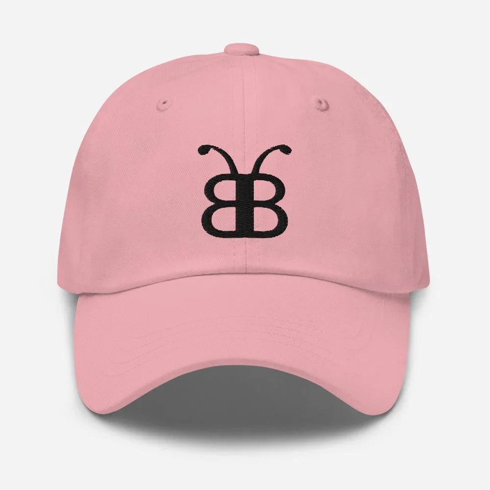Pink dad hat with black butterfly logo, streetwear fashion accessory