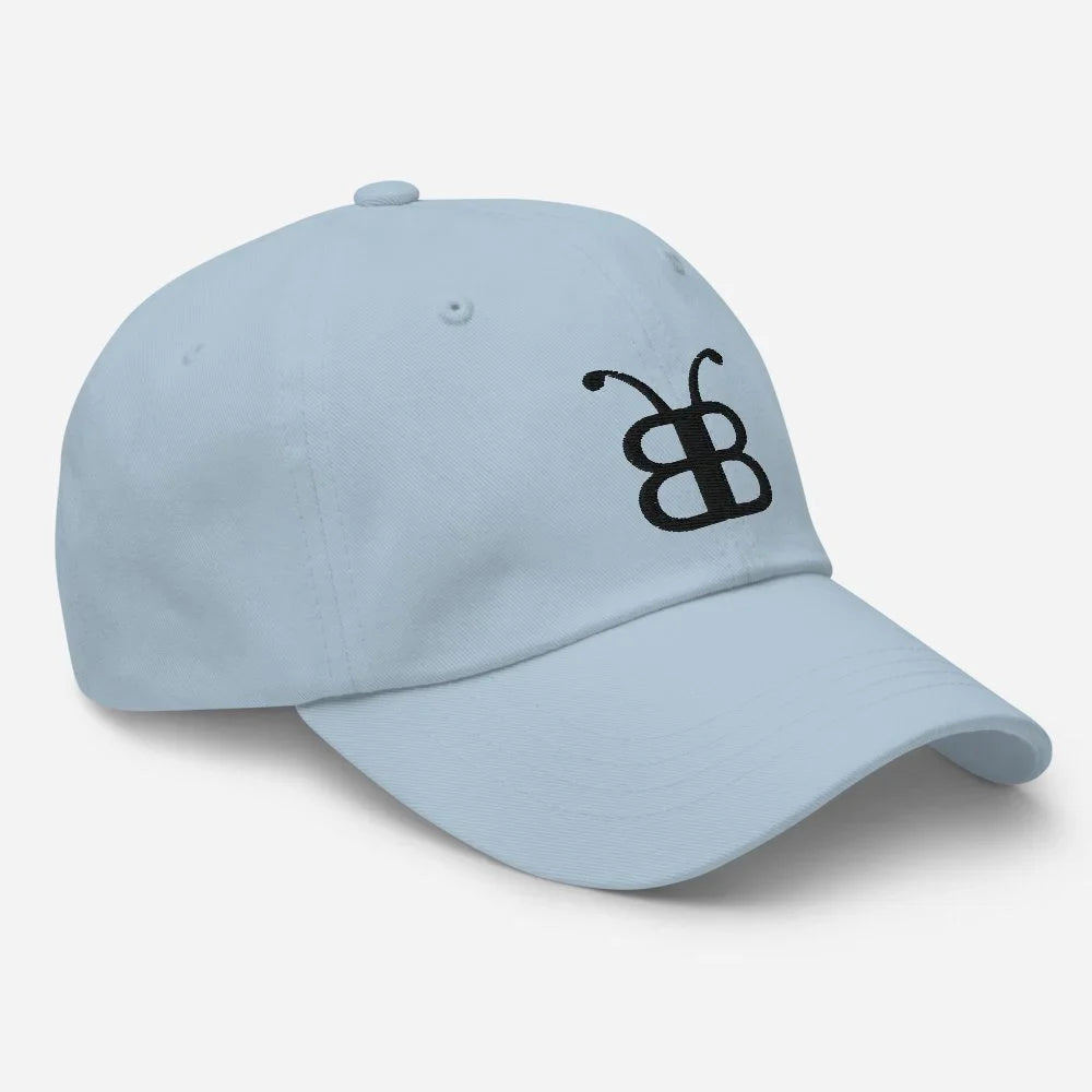 Light blue dad hat with black butterfly logo, streetwear style accessory