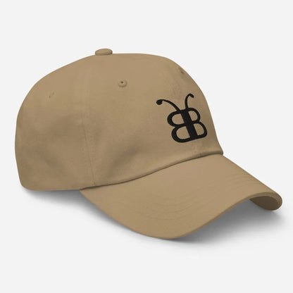 Tan dad hat with black embroidered butterfly logo, streetwear style accessory