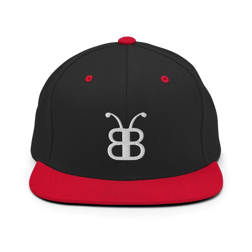 Black and red snapback cap with white embroidered logo, streetwear fashion accessory