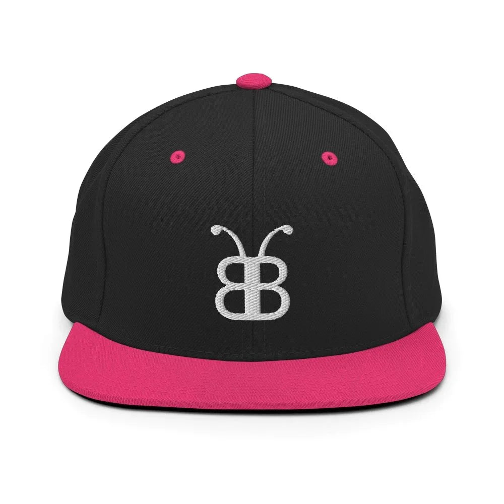 Black and pink snapback hat with white embroidered logo, streetwear fashion accessory
