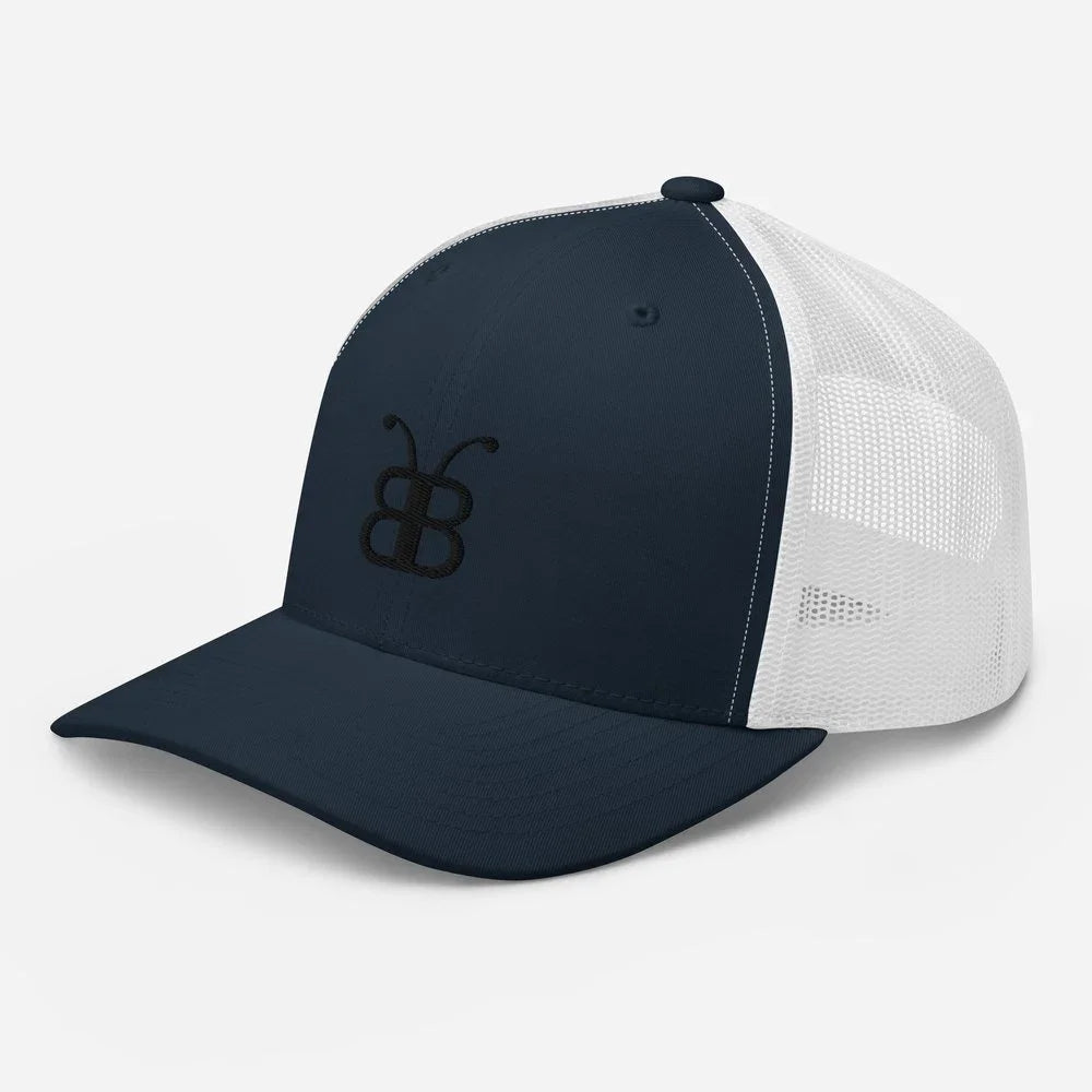 Navy blue and white trucker hat with embroidered logo, streetwear style cap for men