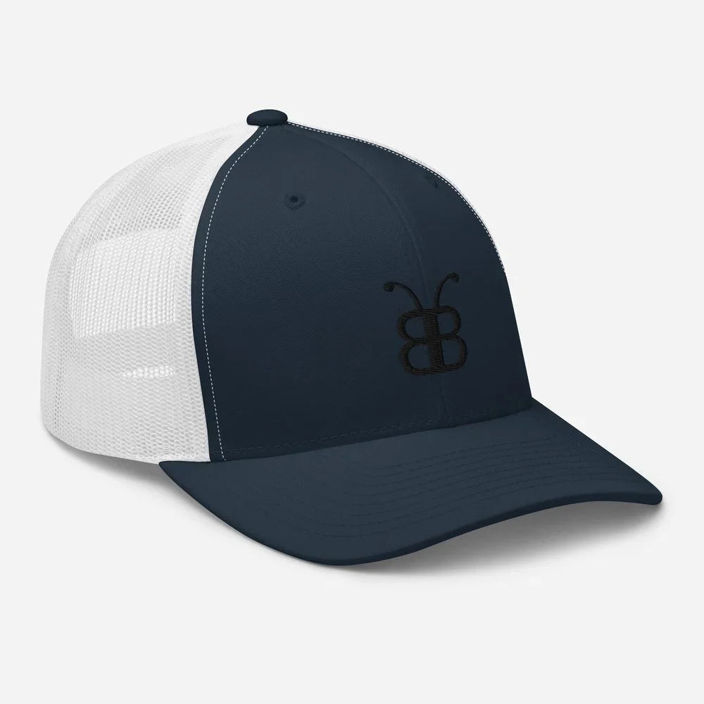 Navy and white trucker hat with embroidered logo, streetwear style, eco-friendly fashion