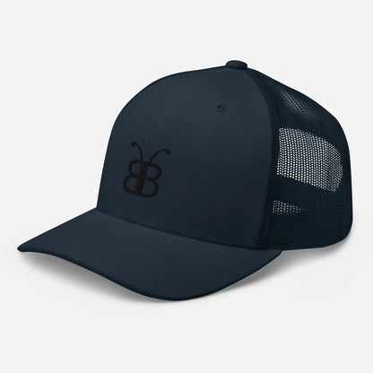 Navy blue trucker hat with embroidered butterfly logo, mesh back, streetwear style