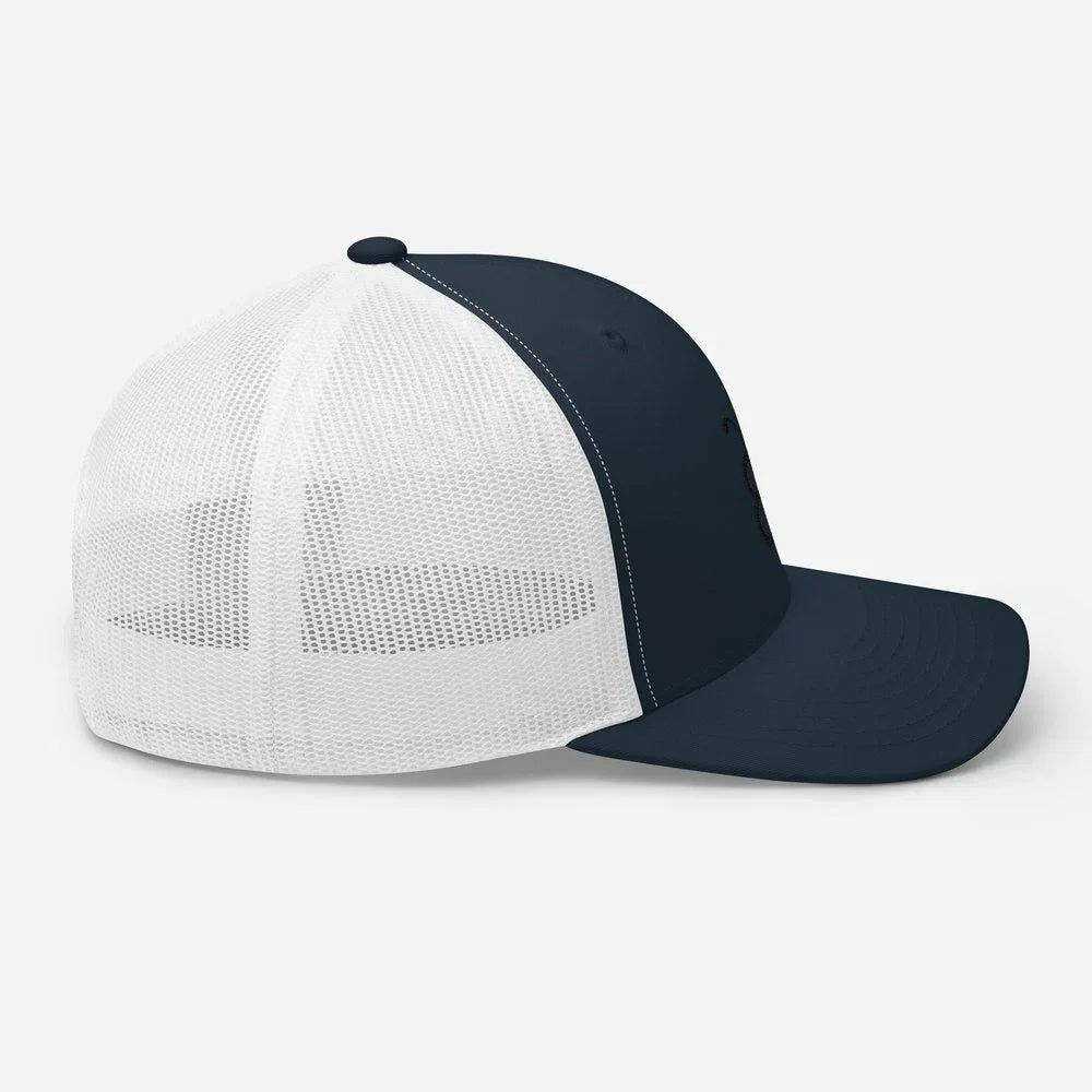 White and navy blue trucker hat with mesh back, stylish streetwear accessory for casual fashion