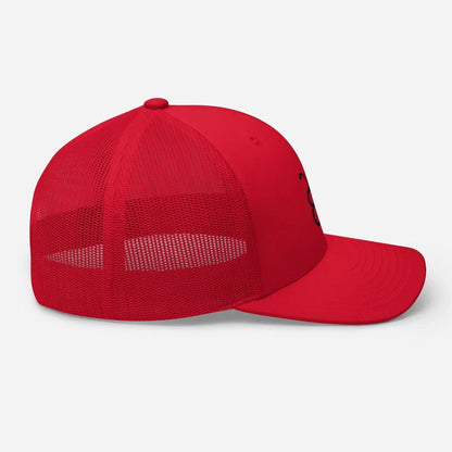 Red trucker hat with black logo, mesh back, flat brim — streetwear style