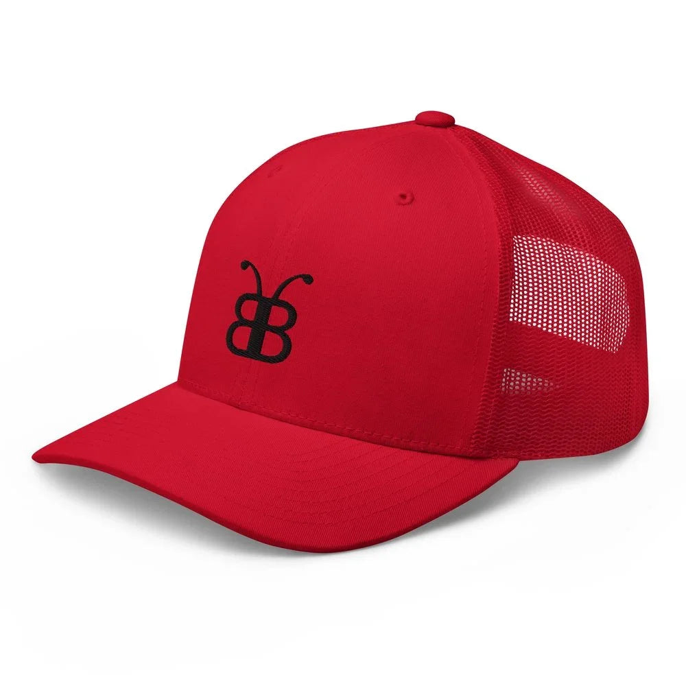 Red trucker hat with black butterfly logo, streetwear style, breathable mesh back